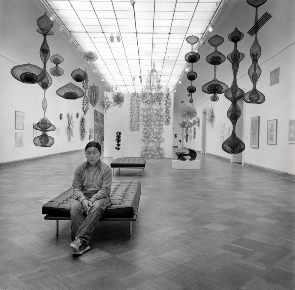 a portrait of Ruth Asawa at the San Francisco museum of art in 1973